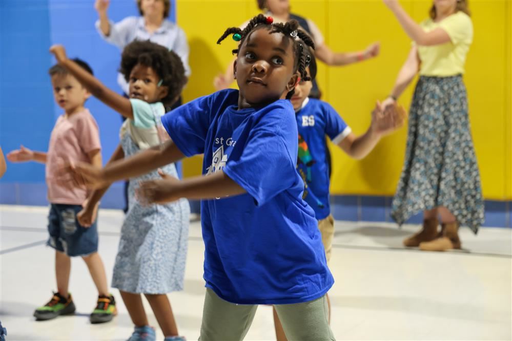  kids dancing in PE class